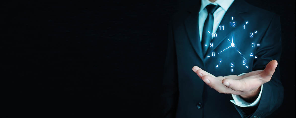 Businessman holding clock  Business time management 
