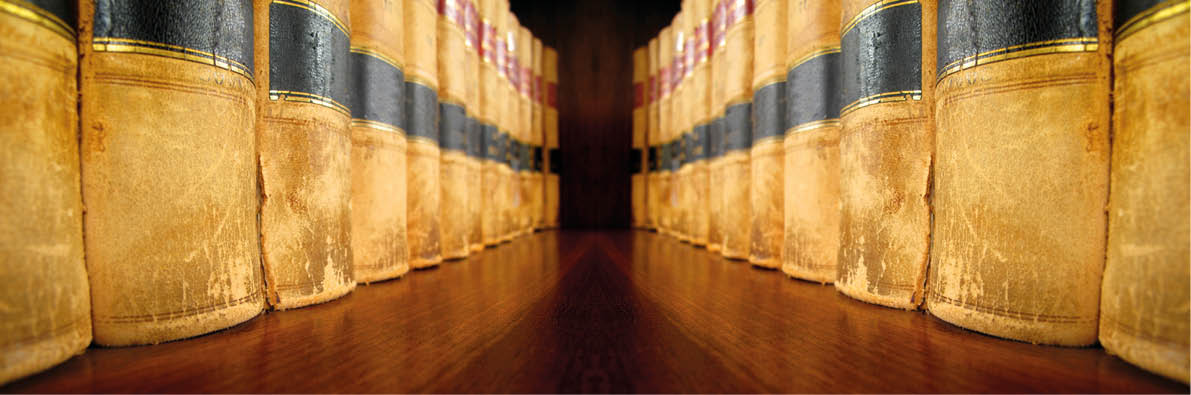 Row of old leather law books on a shelf