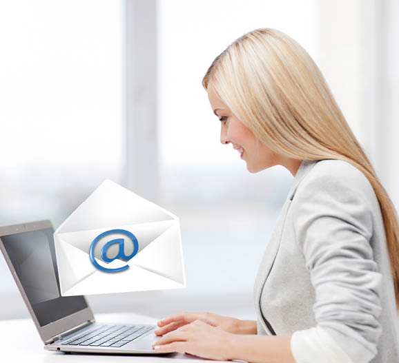 picture of beautiful woman with laptop computer sending email
