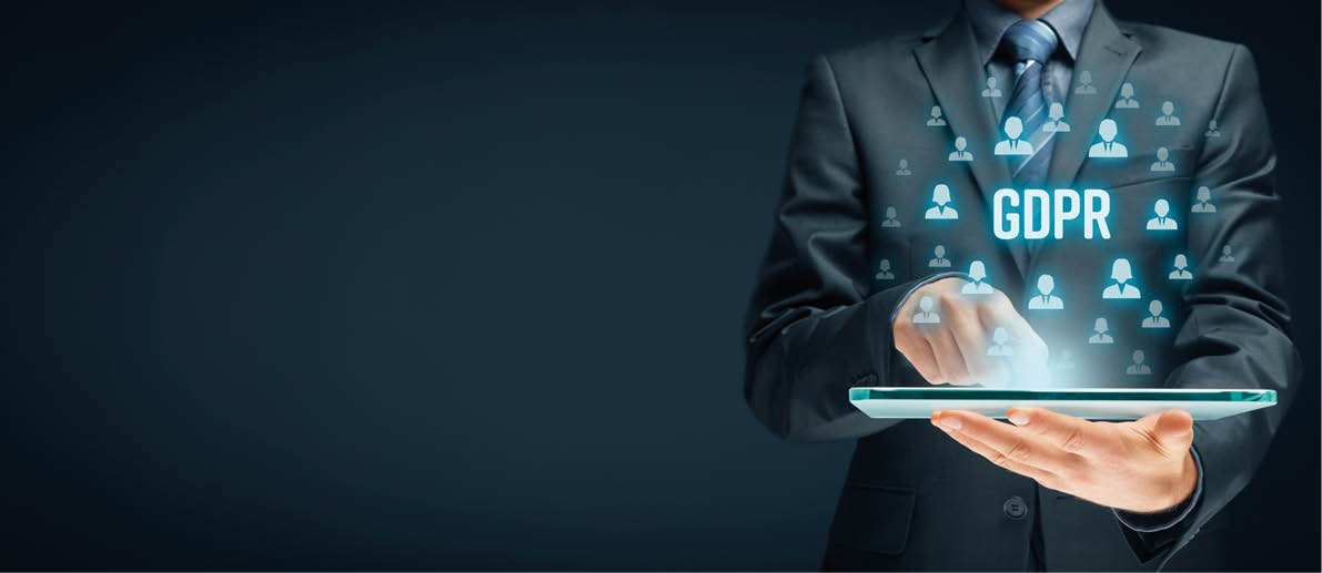 GDPR (general data protection regulation) concept  Businessman or IT technologist with text GDPR and icons of people 