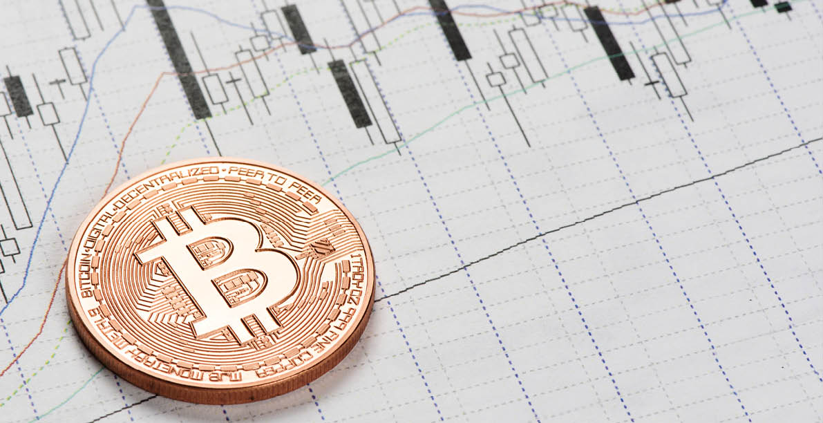 cryptocurrency  bitcoin coin on a stock market charts
