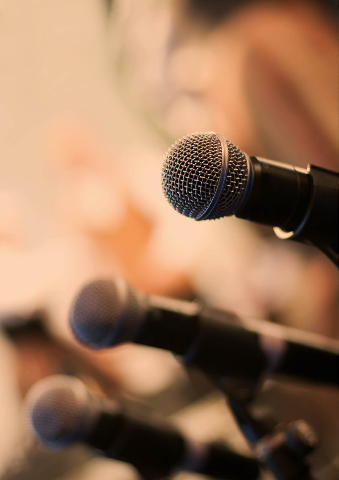 Microphone on abstract blurred background (shallow DoF)
