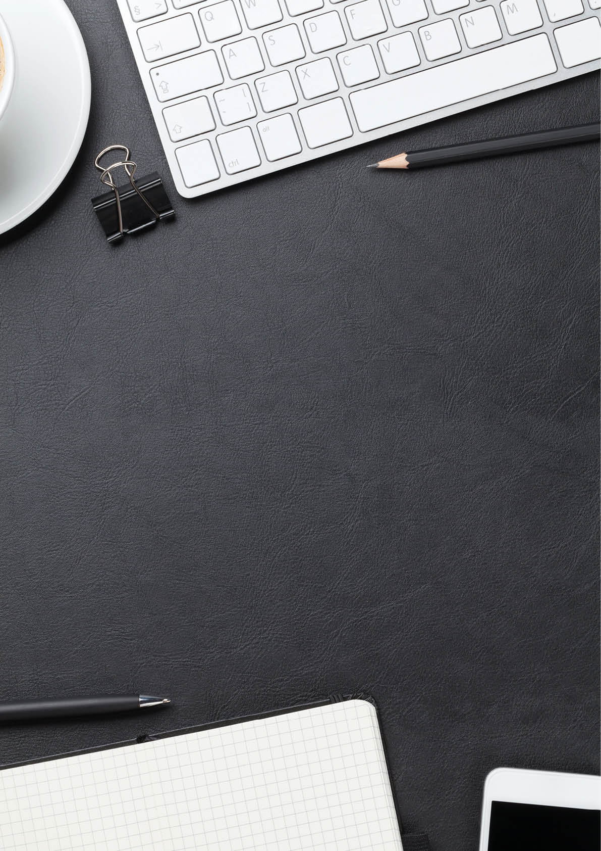 Office leather desk table with computer, supplies and coffee cup  Top view with copy space