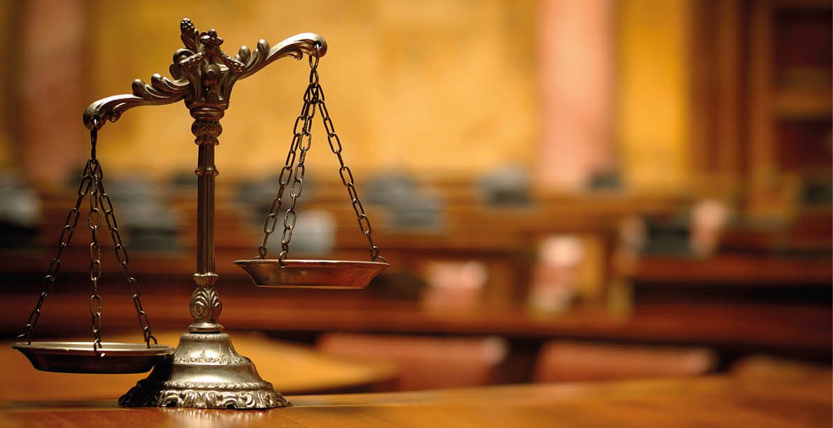 Symbol of law and justice in the empty courtroom, law and justice concept 