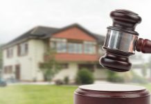 Aumento de capital social mediante aportación no dineraria de un inmueble gravado con un derecho de uso