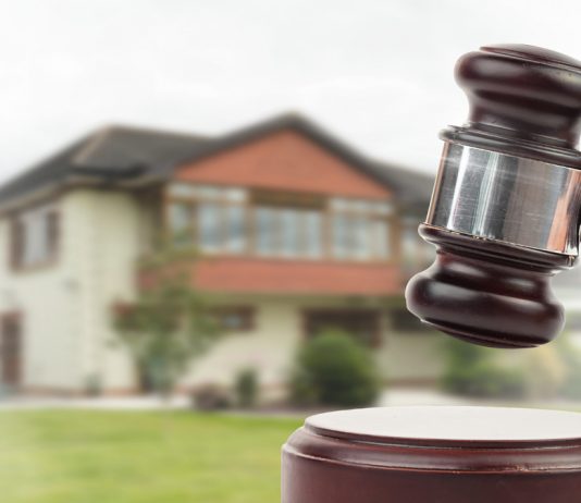 Aumento de capital social mediante aportación no dineraria de un inmueble gravado con un derecho de uso