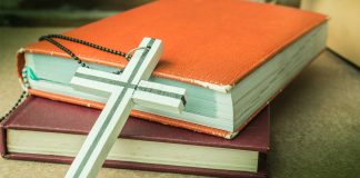 La prohibición de símbolos religiosos en el puesto de trabajo: política de empresa y derechos del trabajador