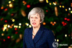 Una debilitada May acude a Bruselas en busca de ayuda para el Brexit La primera ministra Theresa May habla en el 10 de Downing Street tras una moción de censura de parlamentarios conservadores en Londres, el 12 de diciembre de 2018