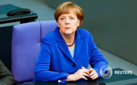 German Chancellor Angela Merkel commemorates the centenary of the massacre of 1.5 million Armenians by Ottoman Turk forces, during a regular session of the German lower house of Parliament, Bundestag, in Berlin, Germany April 24, 2015