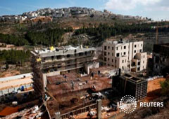 Los asentamientos de Ramot y Ramat Shlomo (al fondo) en una zona de la cocupada Cisjordania que Israel anexionó a Jerusalén, el 22 de enero de 2017