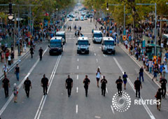 Agentes de los Mossos D'Esquadra patrullan en el Paseo de Gracia de Barcelona antes de una manifestación tras los ataques, el 26 de agosto de 2017.