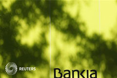 Bruselas aprueba planes para bancos nacionalizados españoles El logo de Bankia en un cajero el 25 de junio de 2012 en Madrid