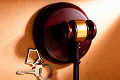 ‘Comentarios a la Ley Hipotecaria’: para comprender y aprovechar las ventajas de nuestro sistema registral inmobiliario Mazo y llavero con una casita