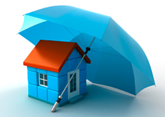 Una casita protegida por un paraguas
