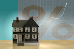 El heredero sólo responde de las deudas asociadas al inmueble en proporción a la masa hereditaria que adquiere Una casita con un gráfico y el símbolo del %