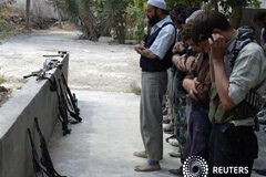 Los rebeldes sirios rechazan una coalición, piden un liderazgo islámico Combatientes del Ejército Libre de Siria rezan en Qasimiya, cerca de Damasco, el 24 de septiembre de 2013