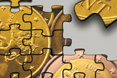 ¿Quién asume los costes en una reestructuración empresarial? Un puzzle con la imagen de monedas de euro.