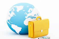 Obstáculos y dificultades de los grupos empresariales en la movilidad transnacional de sus trabajadores Bola del mundo, agenda, móvil y maletín