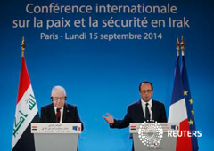 El presidente francés, François Hollande (D) y el presidente iraquí, Fuad Masum, durante la inauguración de la conferencia internacional sobre Irak en París, el 15 de septiembre de 2014