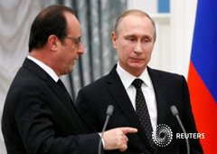 El presidente ruso Vladimir Putin (dcha) y su homólogo francés Francois Hollande tras una conferencia en el Kremlin en Moscú, Rusia, 26 de noviembre de 2015