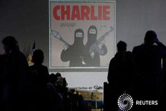 Dos muertos según medios en redada antiterrorista en Bélgica El ataúd de uno de los dibujantes de Charlie Hebdo asesinado en París, el conocido Tignous, durante un homenaje en el ayuntamiento de Montreuil el 15 de enero de 2015
