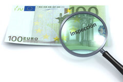 Las inspecciones tributarias aumentaron un 3,6% la recaudación en 2011 Una lupa enfocando un billete de 100 eruos donde se lee 'inspección'