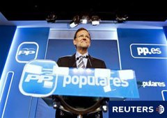 El presidente del PP y candidato a la presidencia del Gobierno, Mariano Rajoy, sonríe en una rueda de prensa en Madrid, el 29 de julio de 2011.
