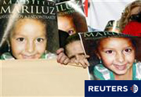 Carteles donde se muestra la foto de Mariluz Carteles donde se muestra la foto de Mariluz