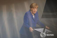 Merkel insta a la UE a mantener reformas porque la crisis no se ha superado Merkel durante un discurso ante el Parlamento alemán en Berlín, el 16 de octubre de 2014