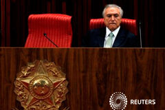 Presidente interino de Brasil dice que el empleo y la confianza serán sus prioridades Temer durante el acto de nombramiento del nuevo presidente de la corte electoral en Brsailia el 12 de mayo