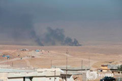 ACNUR teme 100.000 refugiados por el asalto a Mosul y pide más fondos Se ve una humareda tras enfrentamientos con militantes del Estado Islámico al este de Mosul el 17 de octubre de 2016