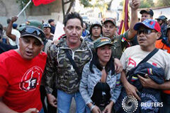 Fallece el presidente de Venezuela Hugo Chávez Seguidores del presidente venezolano Hugo Chavez reaccionan tras el anuncio de su fallecimiento, en Caracas, el 5 de marzo de 2013