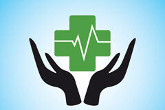 Responsabilidad contractual y seguros de salud Unas manos, símbolo del latido sobre una cruz verde