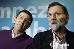 Galicia adelanta las elecciones al 21 de octubre El presidente gallego (izqda.) con el presidente del Gobierno, Mariano Rajoy , en una reunión del partido en la ciudad gallega de Pontevedra