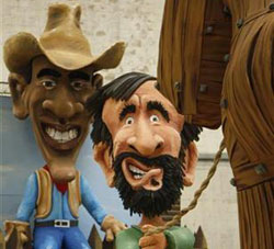 muñecos hechos de papel maché representando al presidente estadounidense Barack Obama y a su colega iraní Mahmud Ahmadinejad (D), que tira de un caballa de Troya en una carroza de carnaval, en los pasados carnavales de Colonia, Alemania, el 9 de febrero d