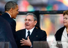 El saludo entre Obama y Raúl Castro despierta esperanzas de acercamiento