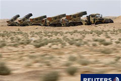 La OTAN aborda la respuesta de la Alianza sobre Libia Lanzacohetes del Ejército libio en el desierto cerca de la puerta oeste de la ciudad de Ajdabiyah, el 16 de marzo de 2011.