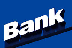 España y Bruselas no se ponen de acuerdo sobre si se está controlando a la banca La palabra Bank en blanco sobre fondo azul.