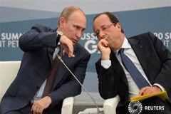 Rusia: El G20 dirá que la economía mejora, pero la crisis no está superada El presidente ruso, Vladimir Putin, y el presidente francés, François Hollande, durnate la reunión del G20 en San Petersburgo, el 6 de septiembre de 2013