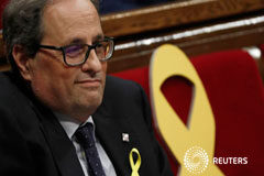 La CUP se abstendrá en la investidura de Torra y permitirá que gobierne Cataluña El candidato a presidente de la Generalitat de Cataluña Quim Torra durante el debate de investidura en el Parlamento regional, el 12 de mayo de 2018