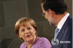 ANÁLISIS-El BCE allana el camino pero ¿pedirá España el rescate? a canciller Angela Merkel (I) mira el 6 de septiembre al presidente español, Mariano Rajoy