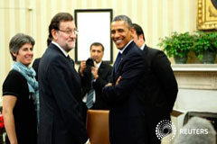 Rajoy cree «satisfactorias» las explicaciones de Obama sobre el espionaje Encuentro entre Rajoy (izq.) y Obama en la Casa Blanca en Washington el 13 de enero