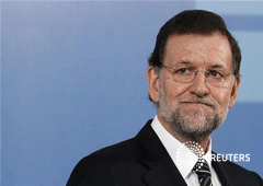 El presidente del Gobierno español, Mariano Rajoy, asiste a una rueda de prensa conjunta con el secretario general de la OCDE