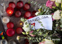 An impromptu memorial for the victims of the Barcelona attack is seen at Blanquerna Cultural Centre in Madrid, Spain, August 21, 2017.