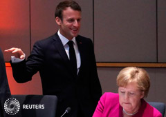 La canciller alemana Angela Merkel y el presidente francés Emmanuel Macron participan de una cumbre europea en Bruselas. 28 de mayo de 2019.