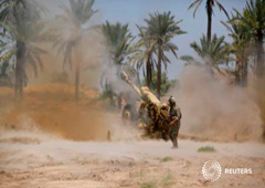 Fuerzas de seguridad iraquíes durante enfrentamientos con miembros de ISIL en Jurf al-Sakhar el 14 de juni ode 2014