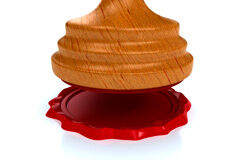 Licitaciones del sector jurídico Sello de cera roja sobre fondo blanco