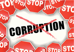 Una mano y las palabras stop corruption