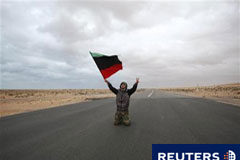 Los tanques de Gadafi se acercan a la plaza rebelde de Zauiya Un rebelde en una carretera durante enfrentamientos con las fuerzas pro-Gadafi cerca de Ras Lanuf, el 8 de marzo de 2011.