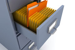 La gestión documental: aumente la eficacia y la eficiencia de las actividades del despacho Un archivador con un cajon abierto.